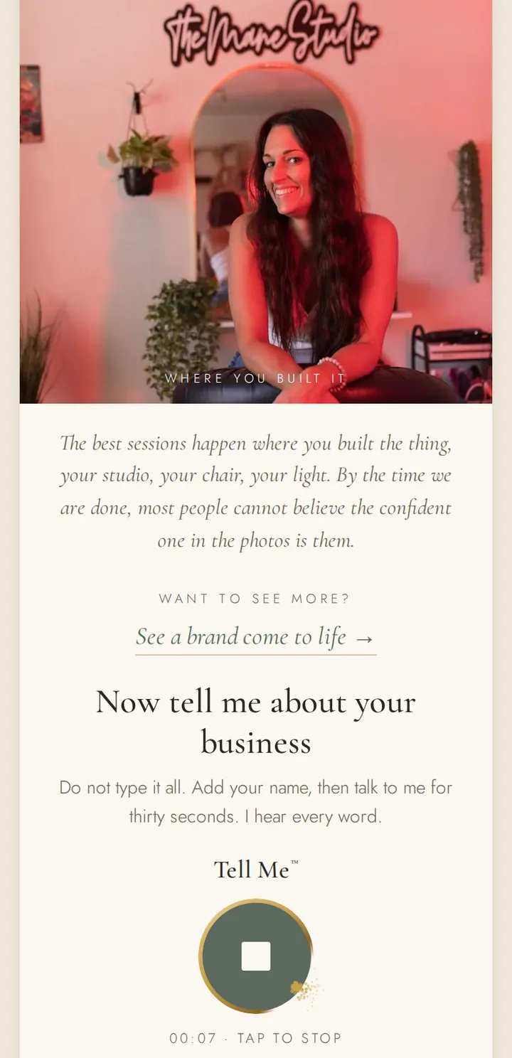 Her Tell Me button in the middle of a recording, under a photo of a studio owner in her own salon.